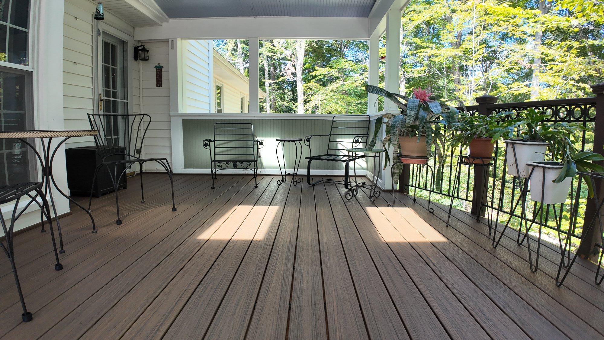 Custom composite deck with cable railing built by Stoneridge in Fredericksburg VA