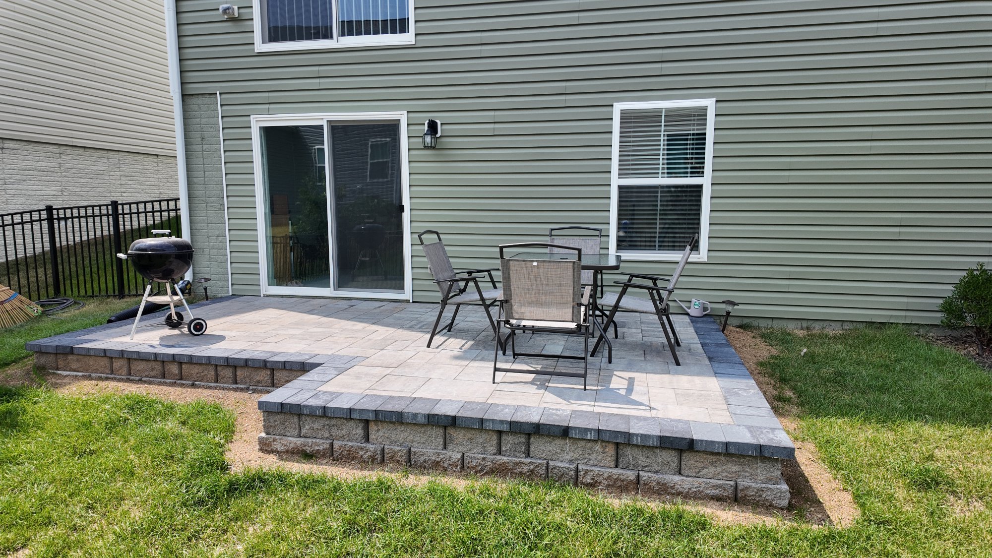 Raised paver patio with dining and grill in Winchester Virginia