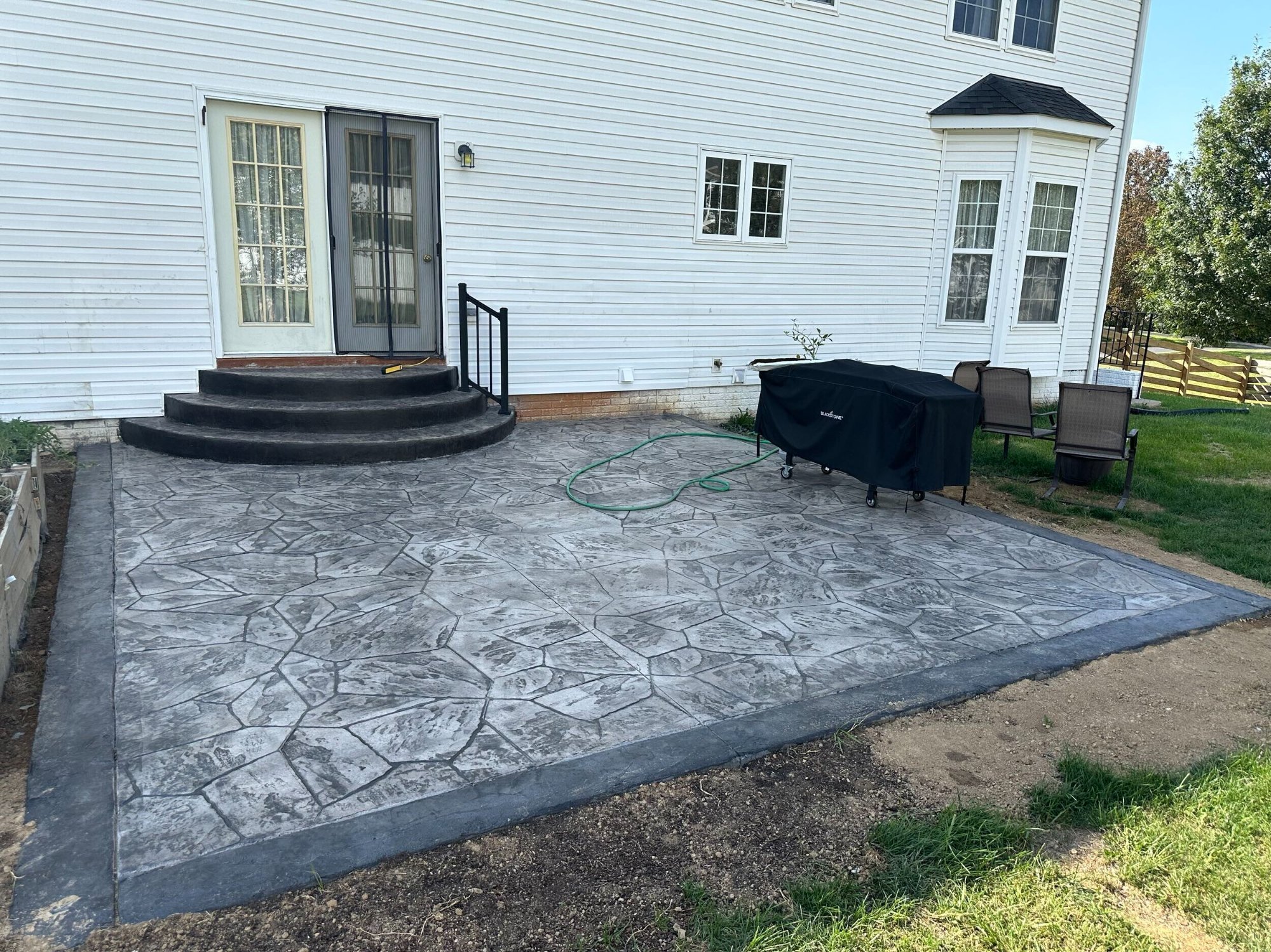 Raised paver patio with dining and grill in Winchester Virginia